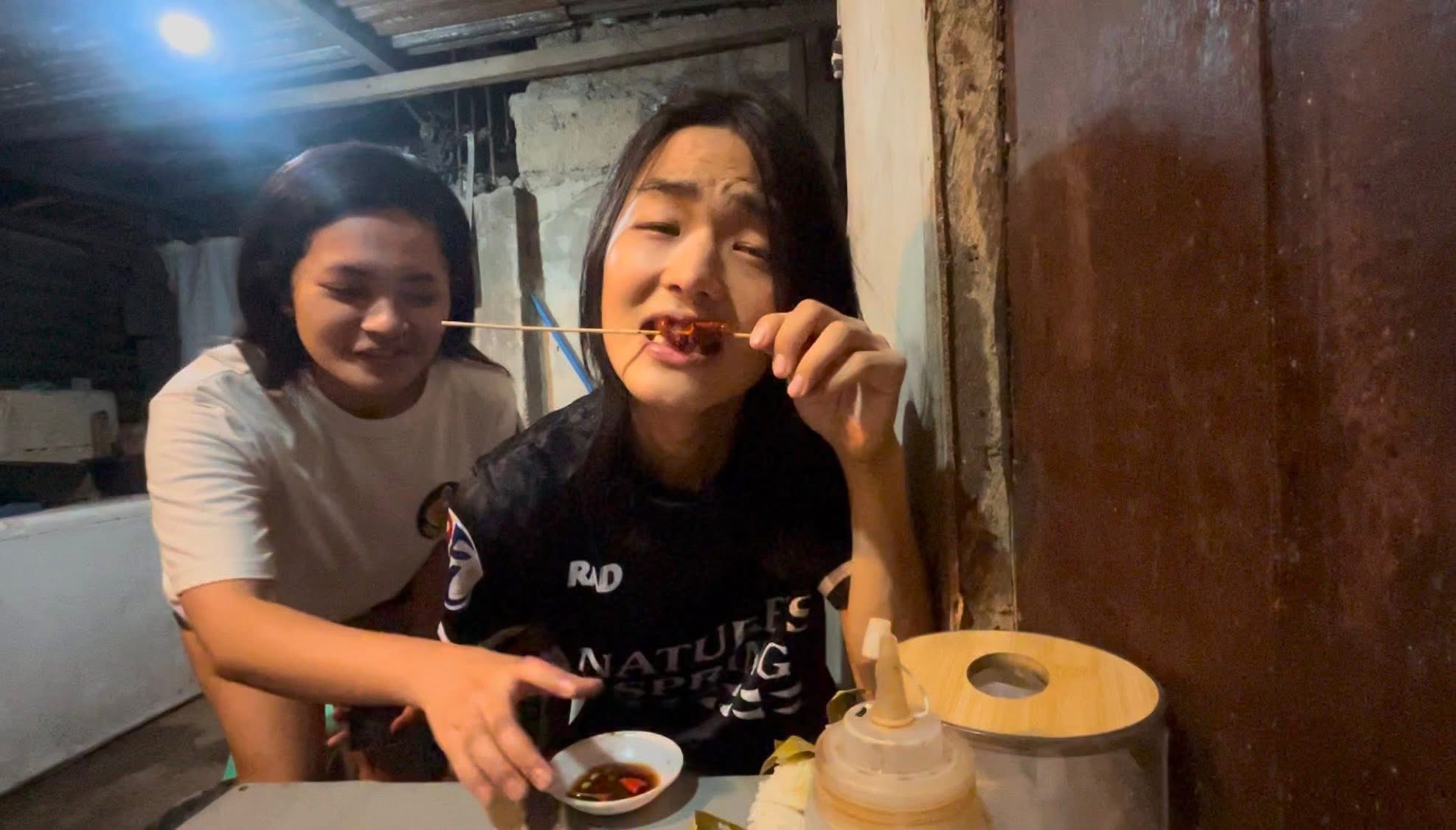 Eating Isaw with Sawsawan Sauce