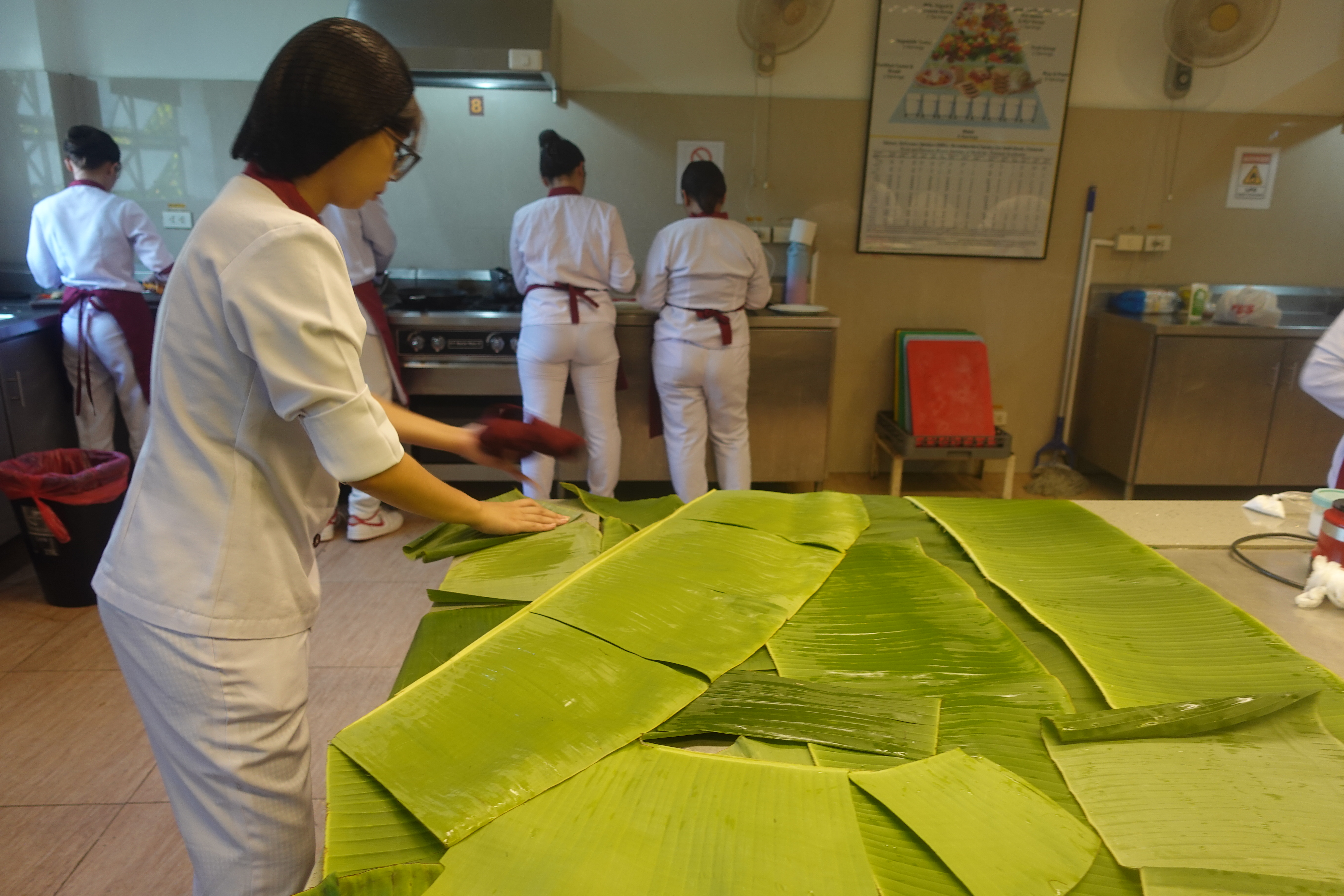 Banana leaf prep in progress
