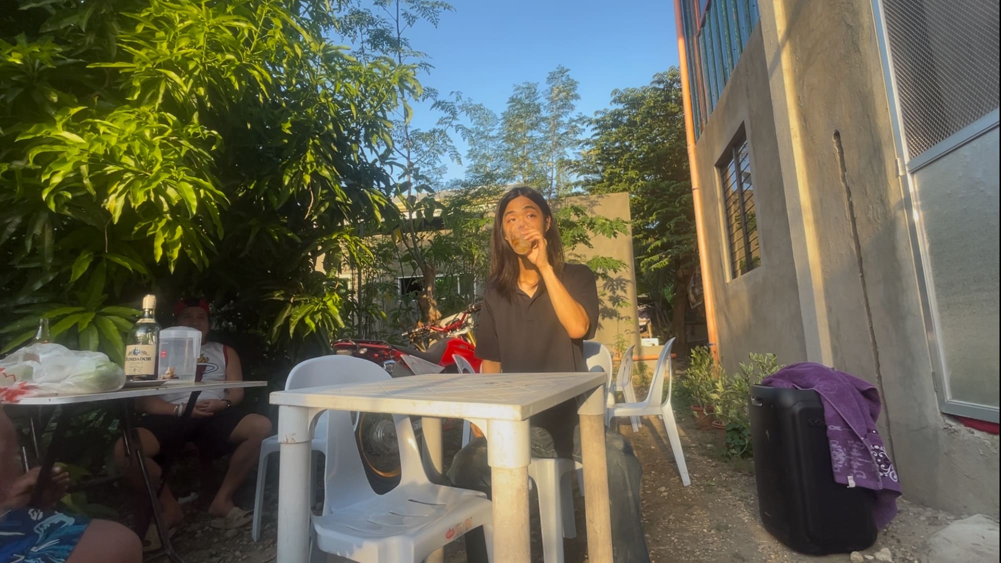 a guy drinking alone in Argao, Cebu