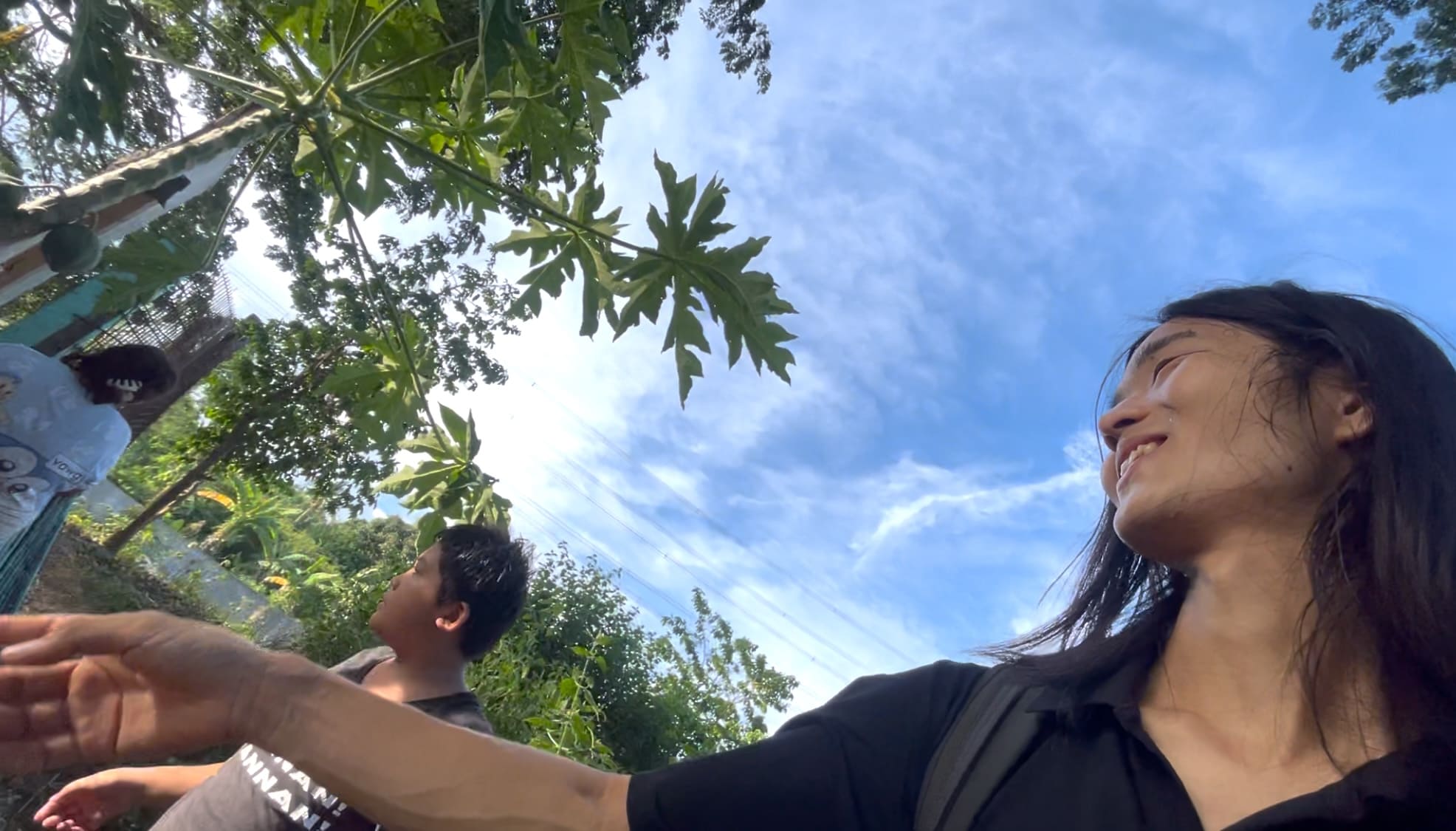 a guy enjoying conversation with locals in Argao, Cebue