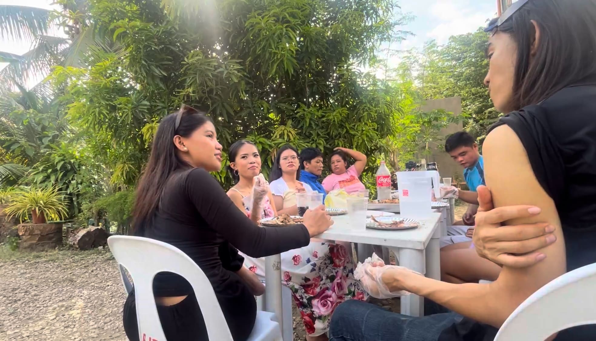 a guy talking to a. girl while eating in Argao, Cebu