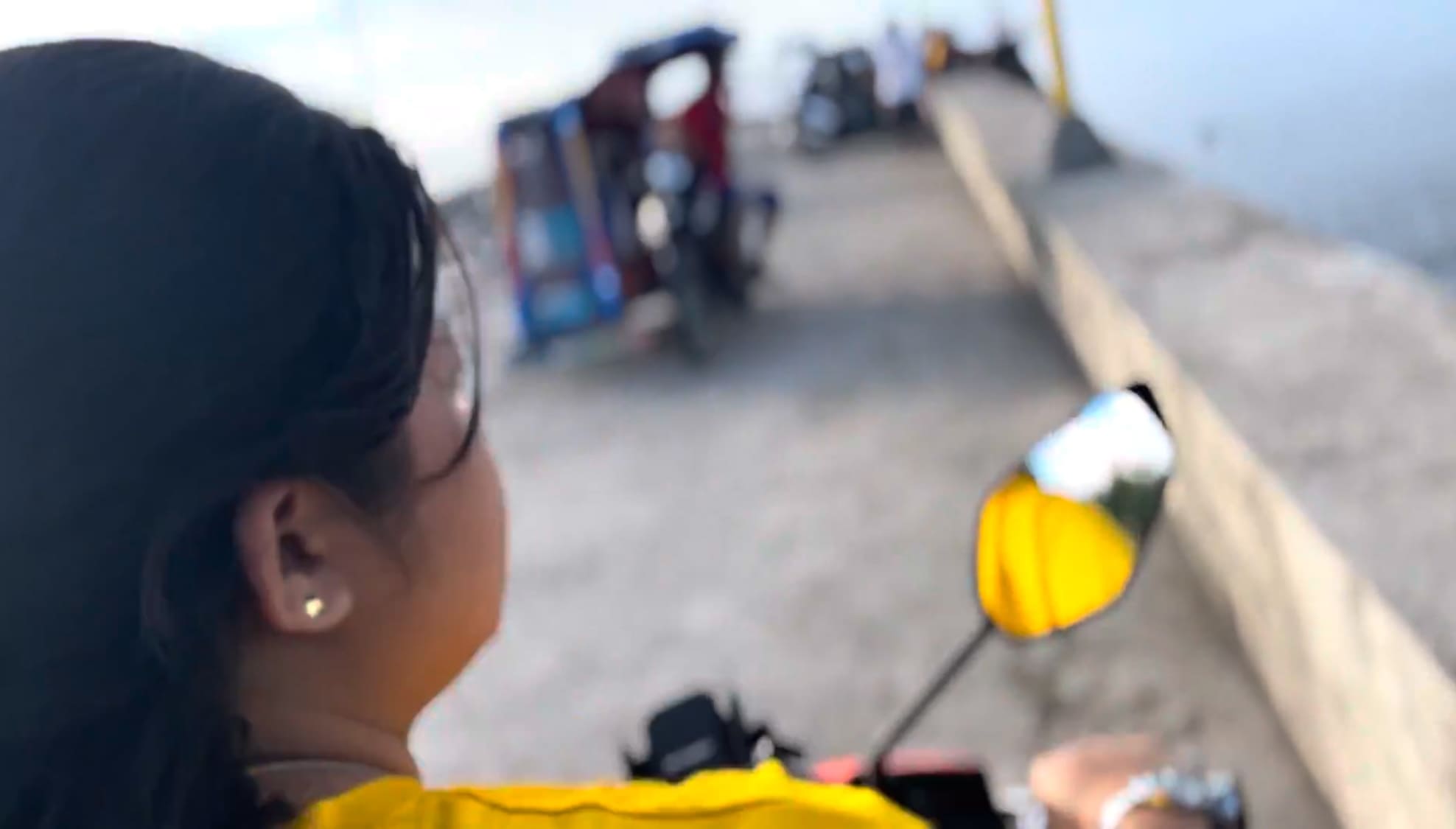 a girl staring at the sea
