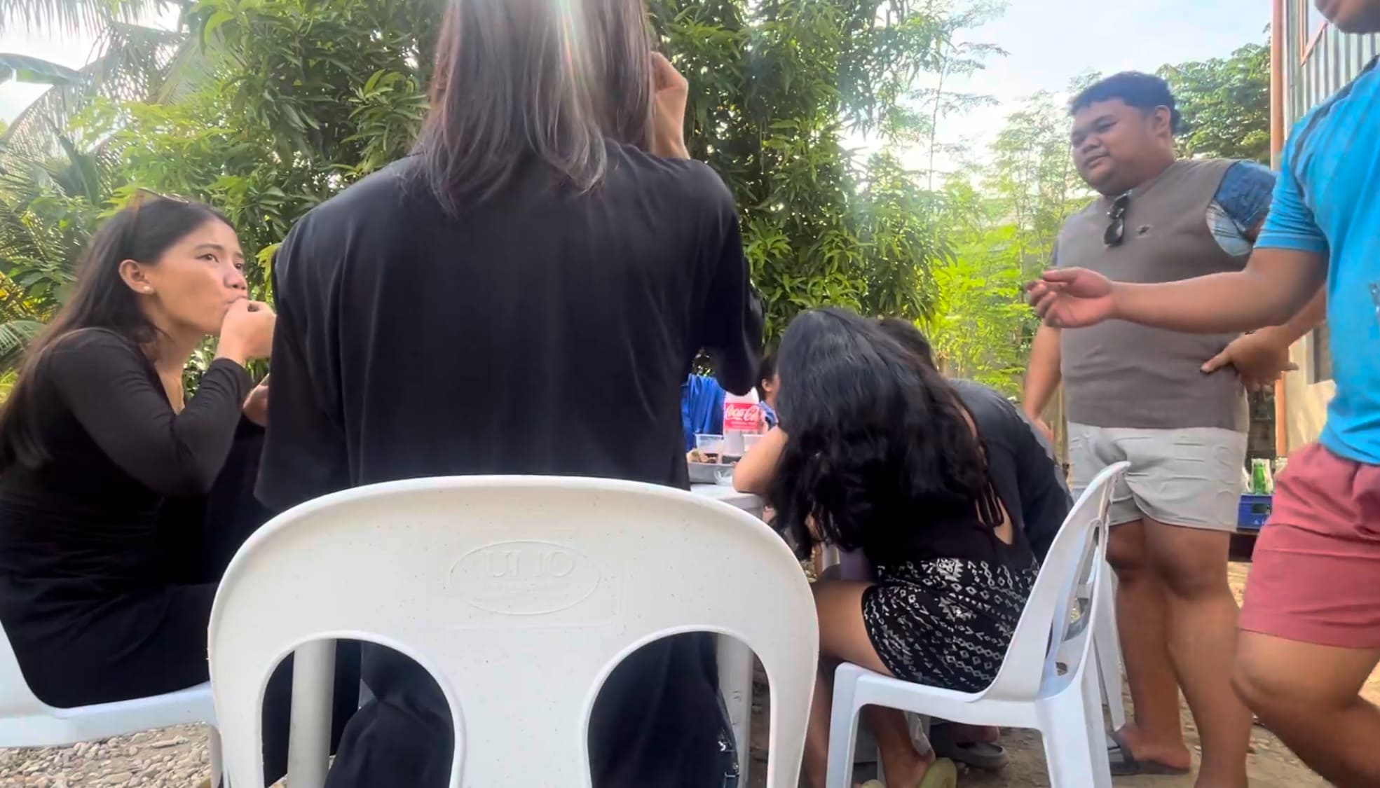 a japanese guy and filipinos having breakfast in Argao, Cebu