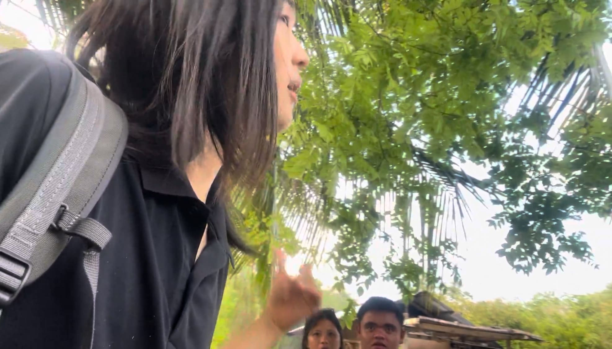 a guy looking surprised after hearing about another unexpected stop from locals in Argao