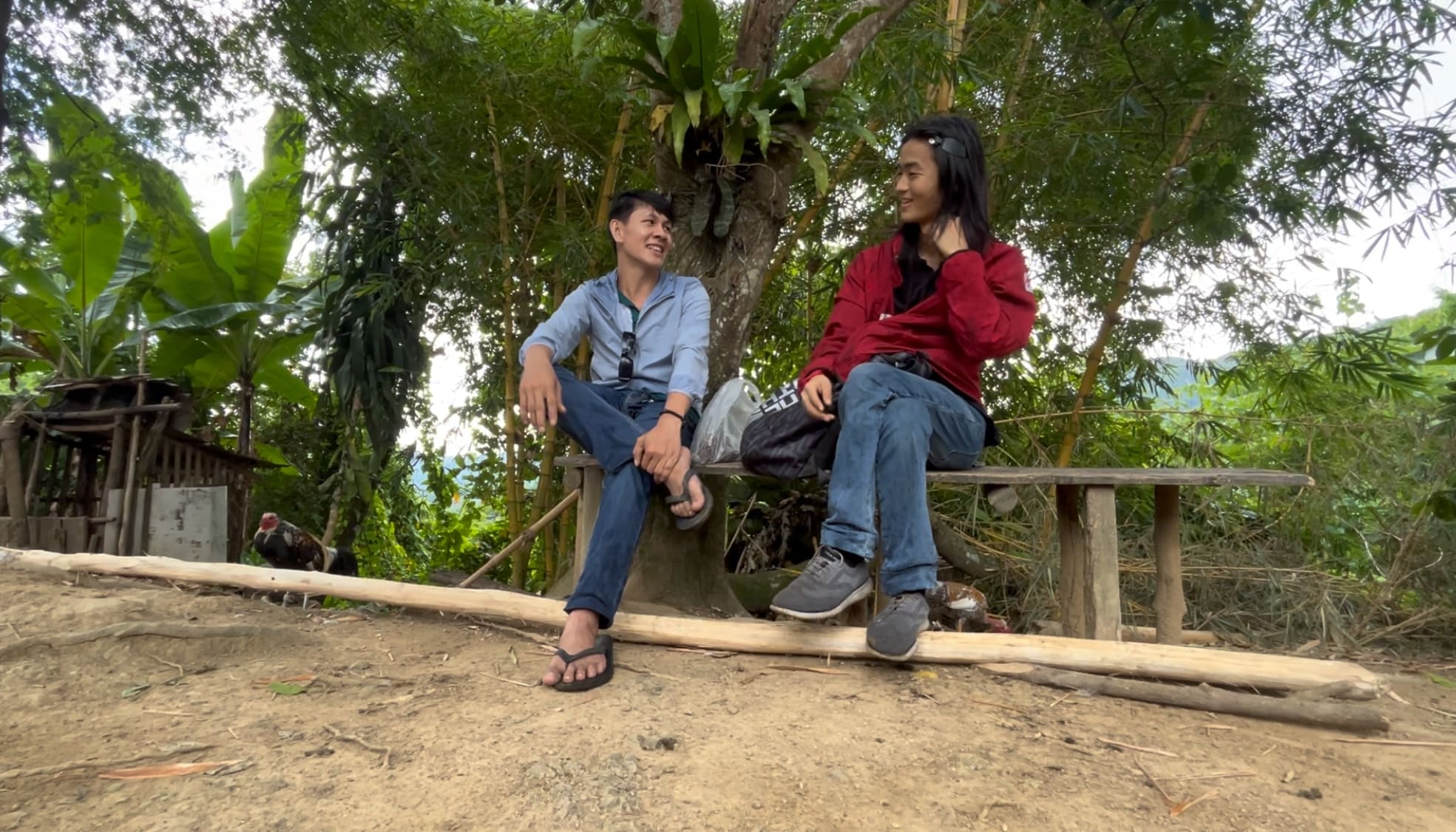two men talking outside in Barangay Amancion