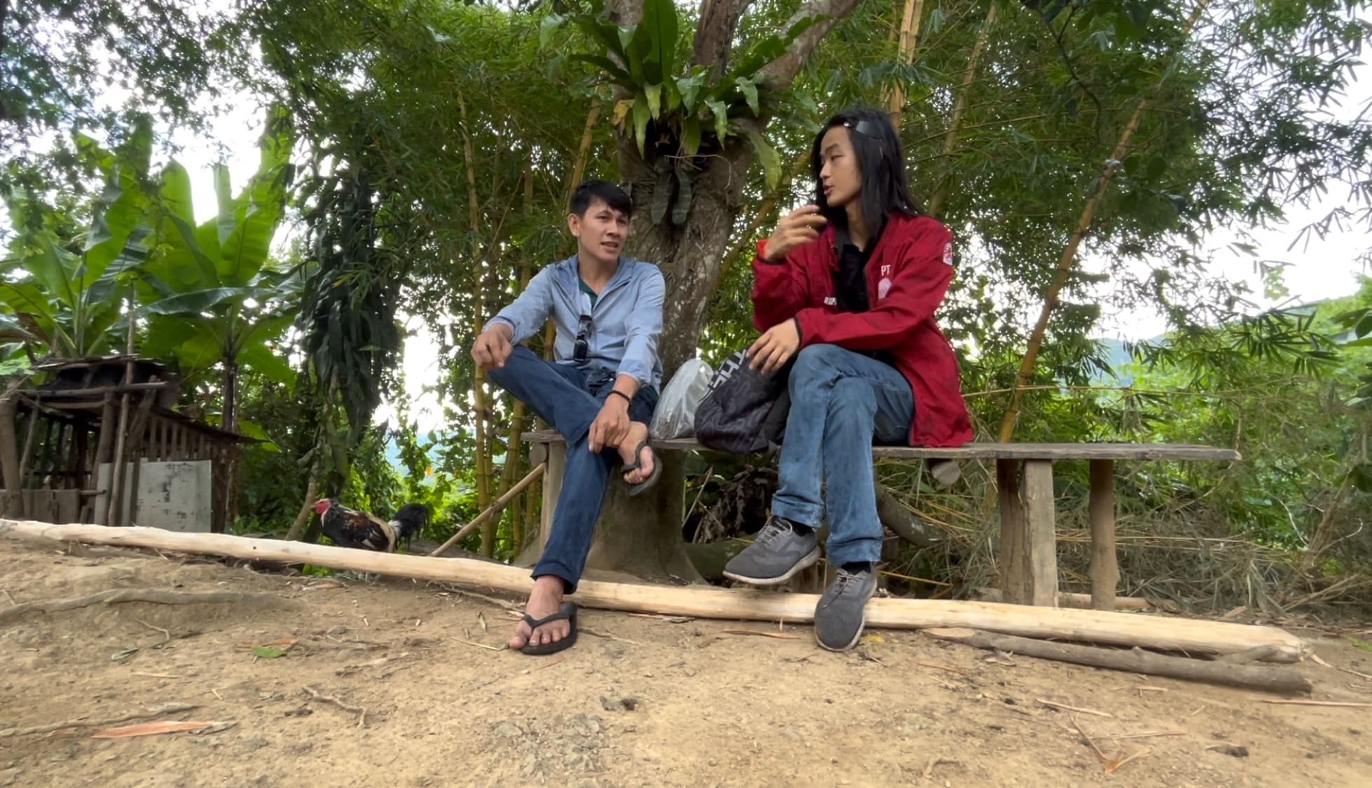 Two men talking in a rural farming area