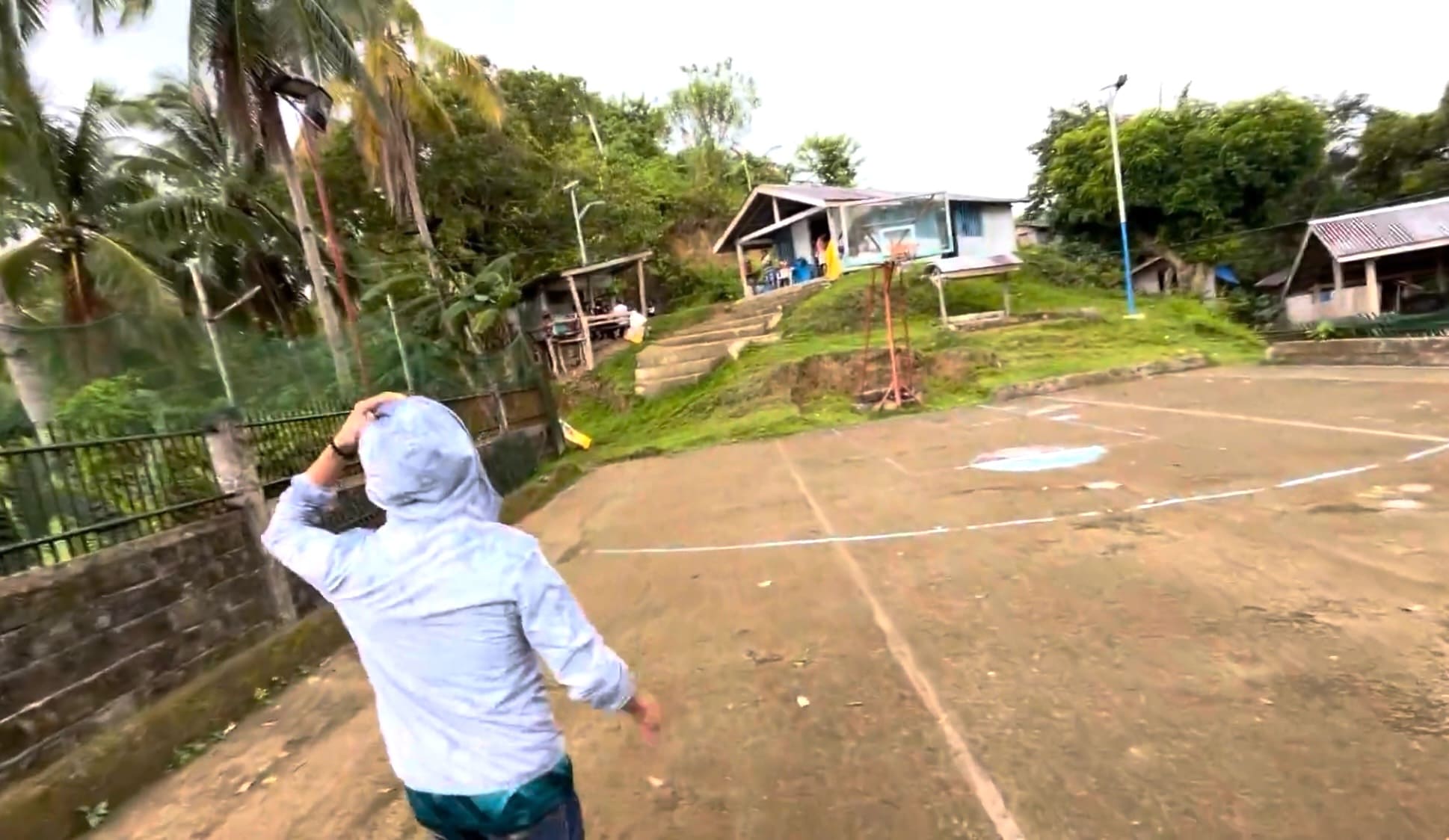 A man walking in Barangay Amancion, Catmon, Cebu