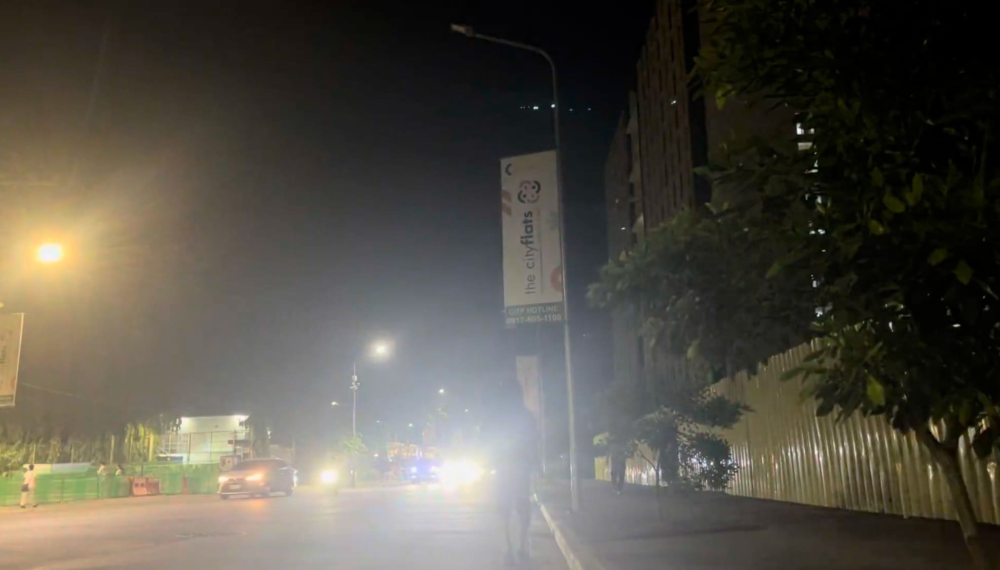Man walking through IT Park at night