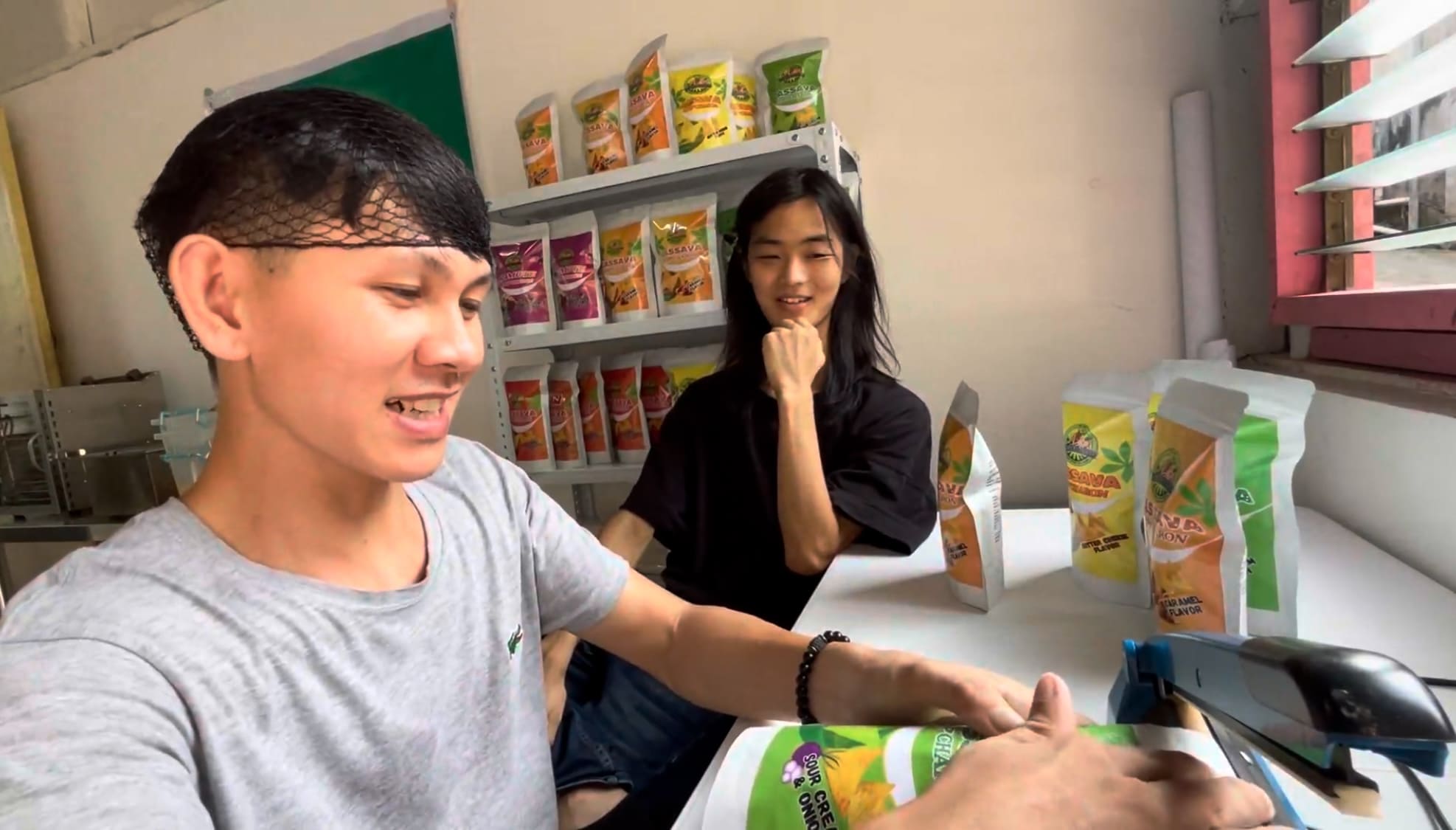 Two men smiling and talking together