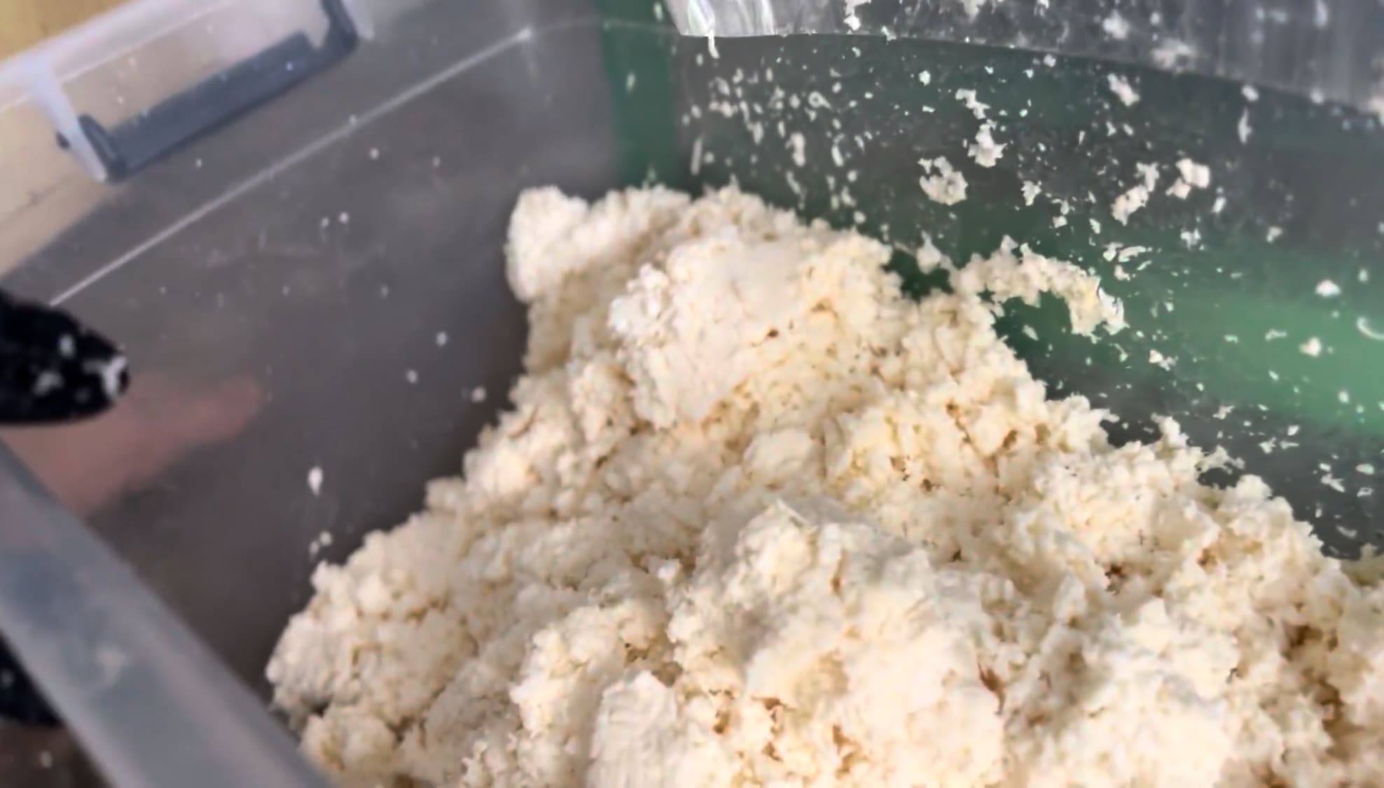 Grated cassava collected after processing in a machine