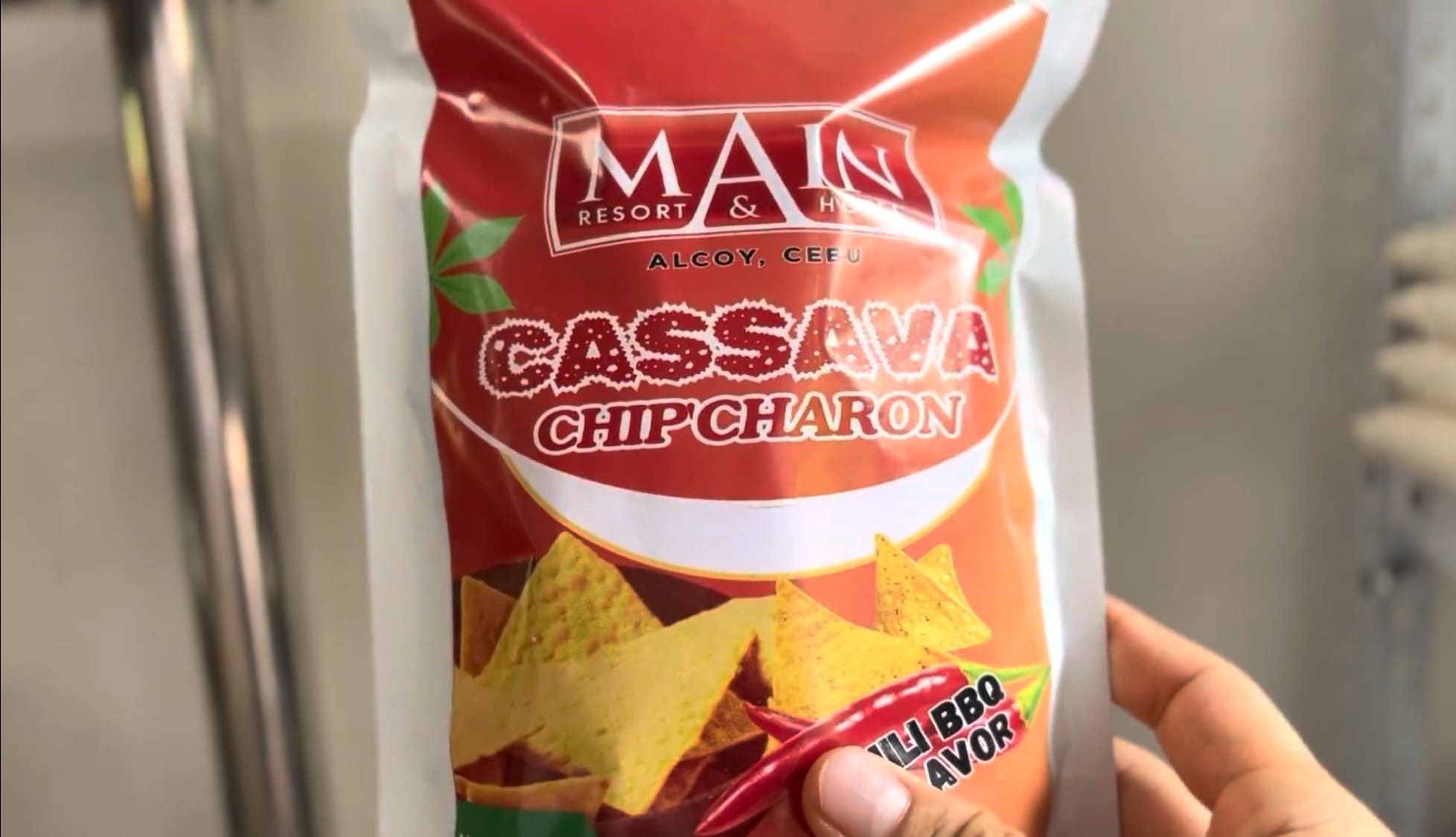 Close-up of a cassava snack package with a hotel brand name on the front