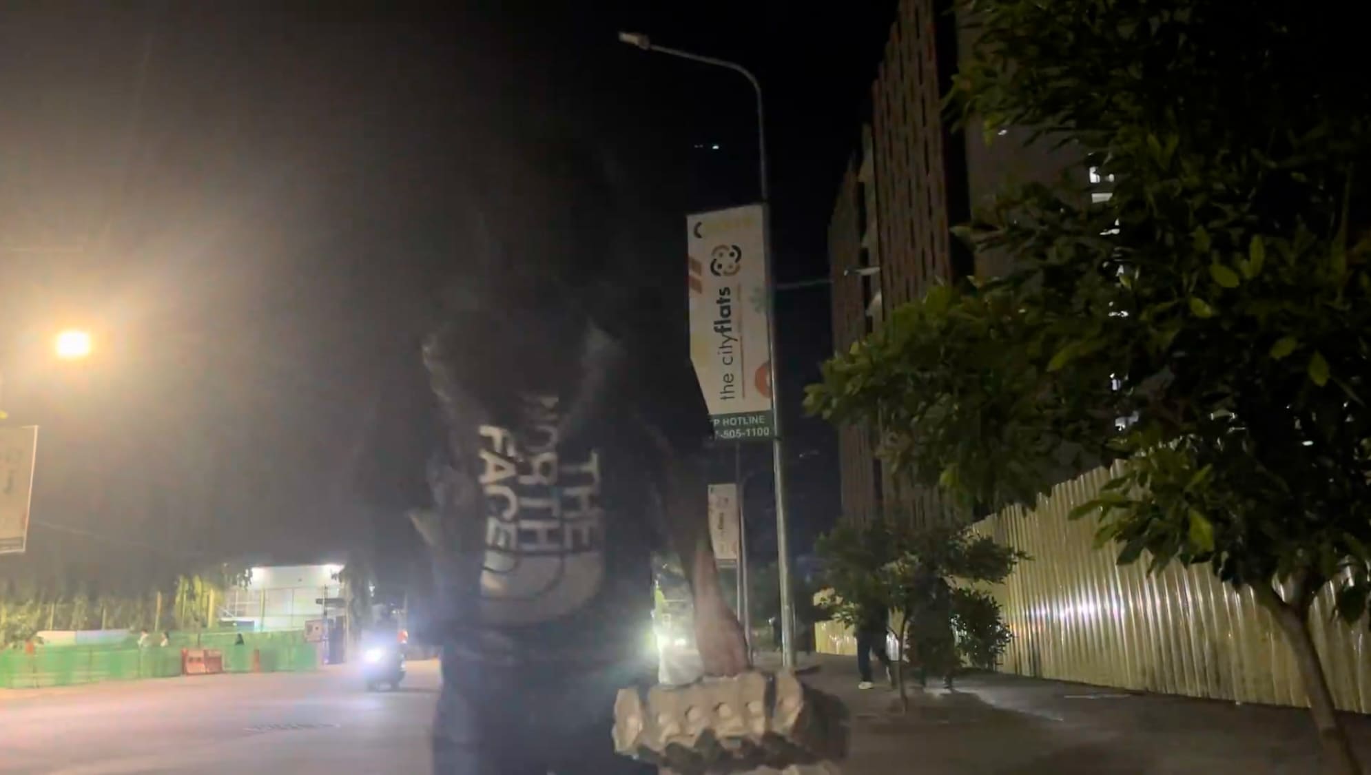 Man returning home in IT Park at night