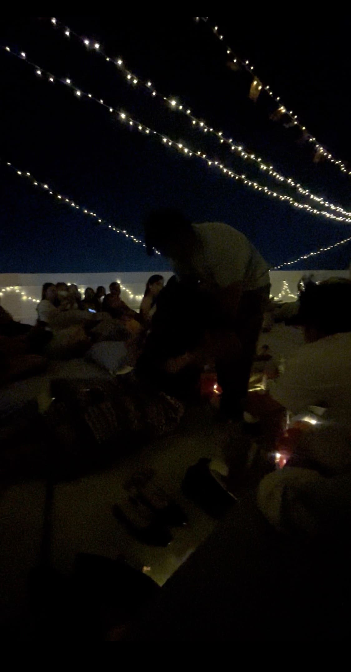 People playing the Bring Me game and laughing during a Cinema Night