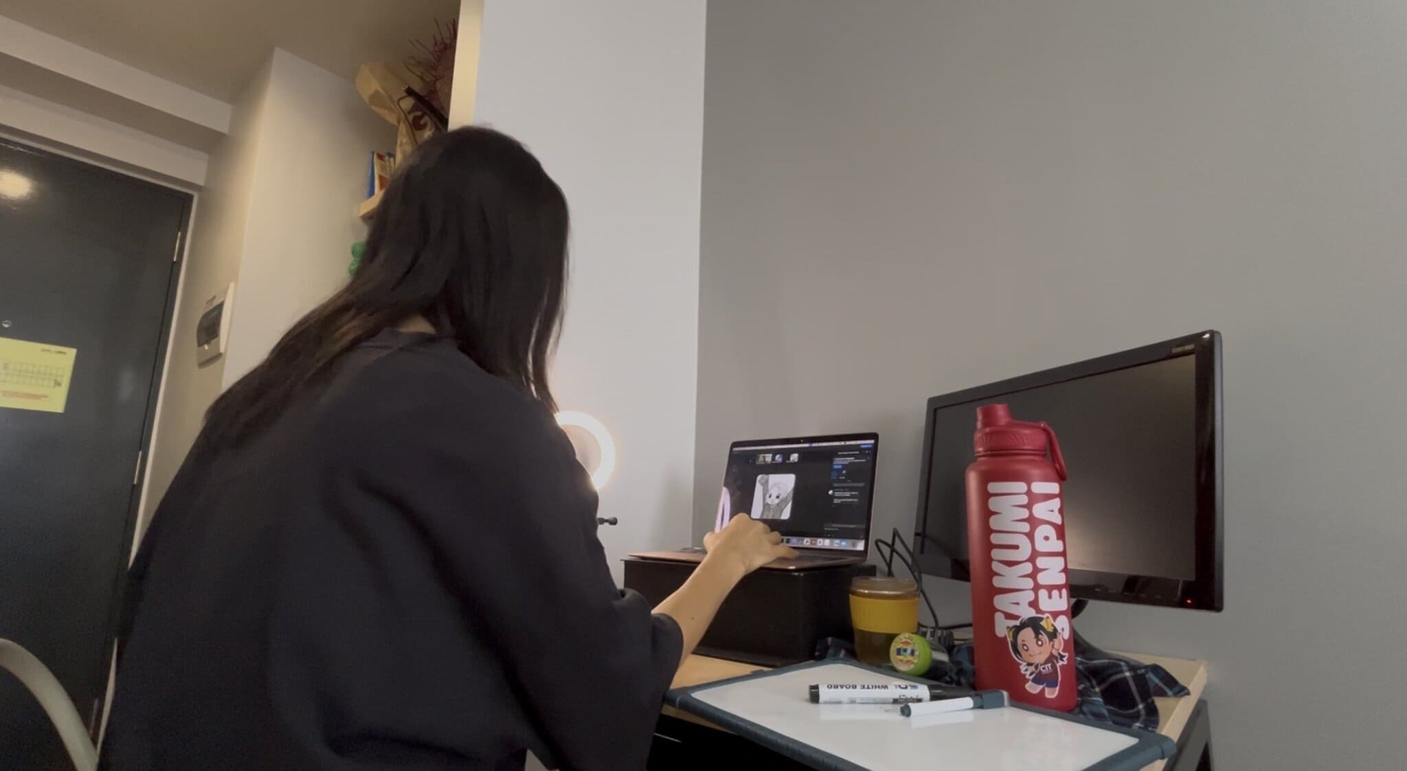 A man on a video call on a laptop
