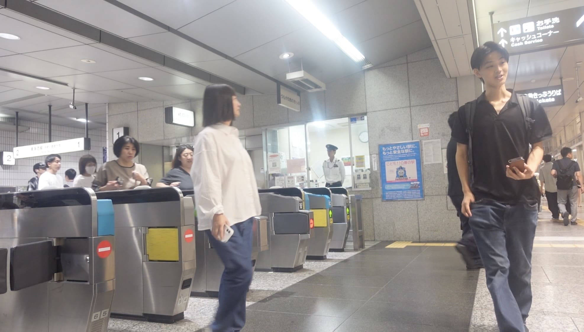Man smiling inside Nagoya Station