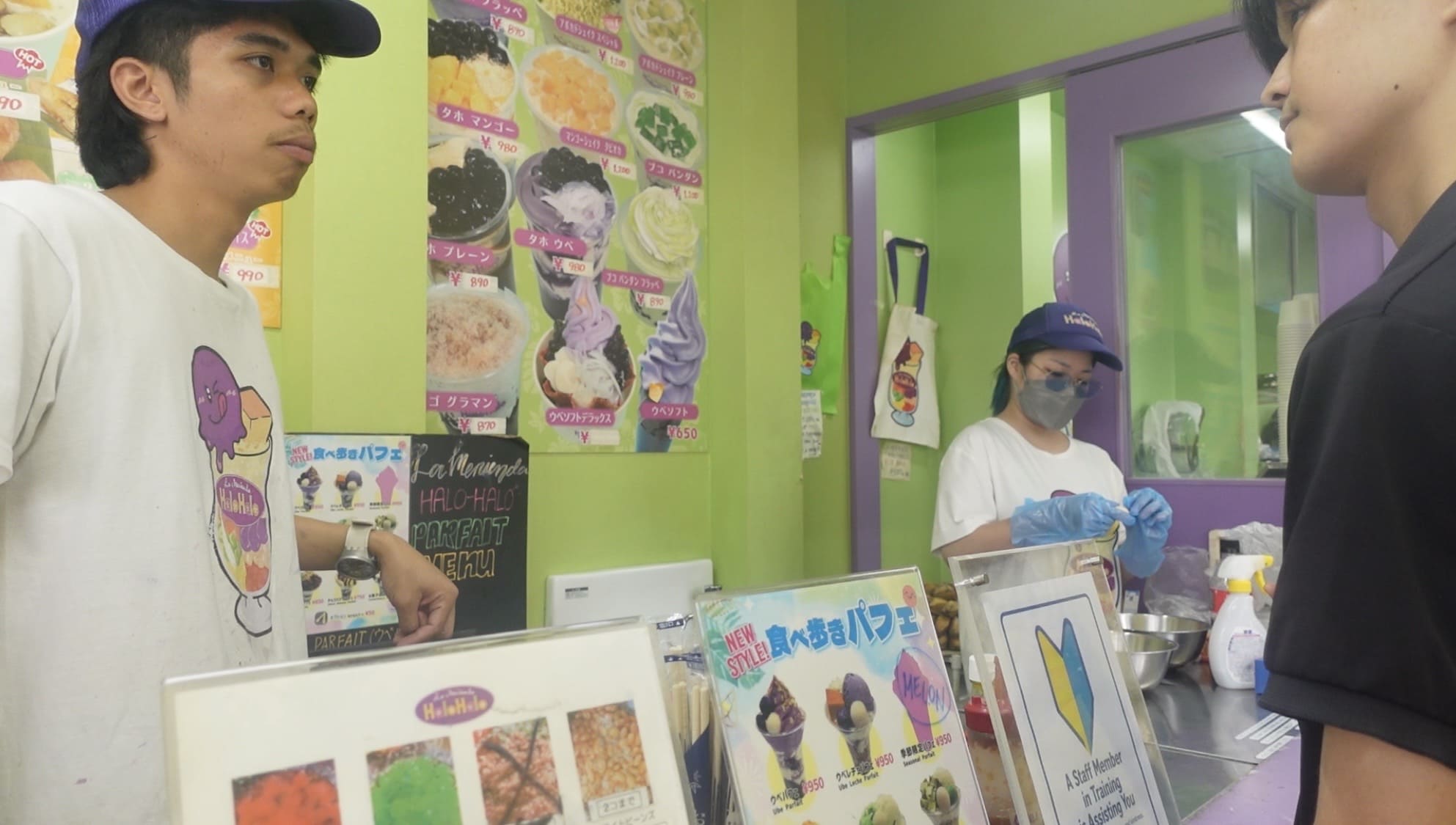 Man looking at halo-halo toppings at a Filipino restaurant