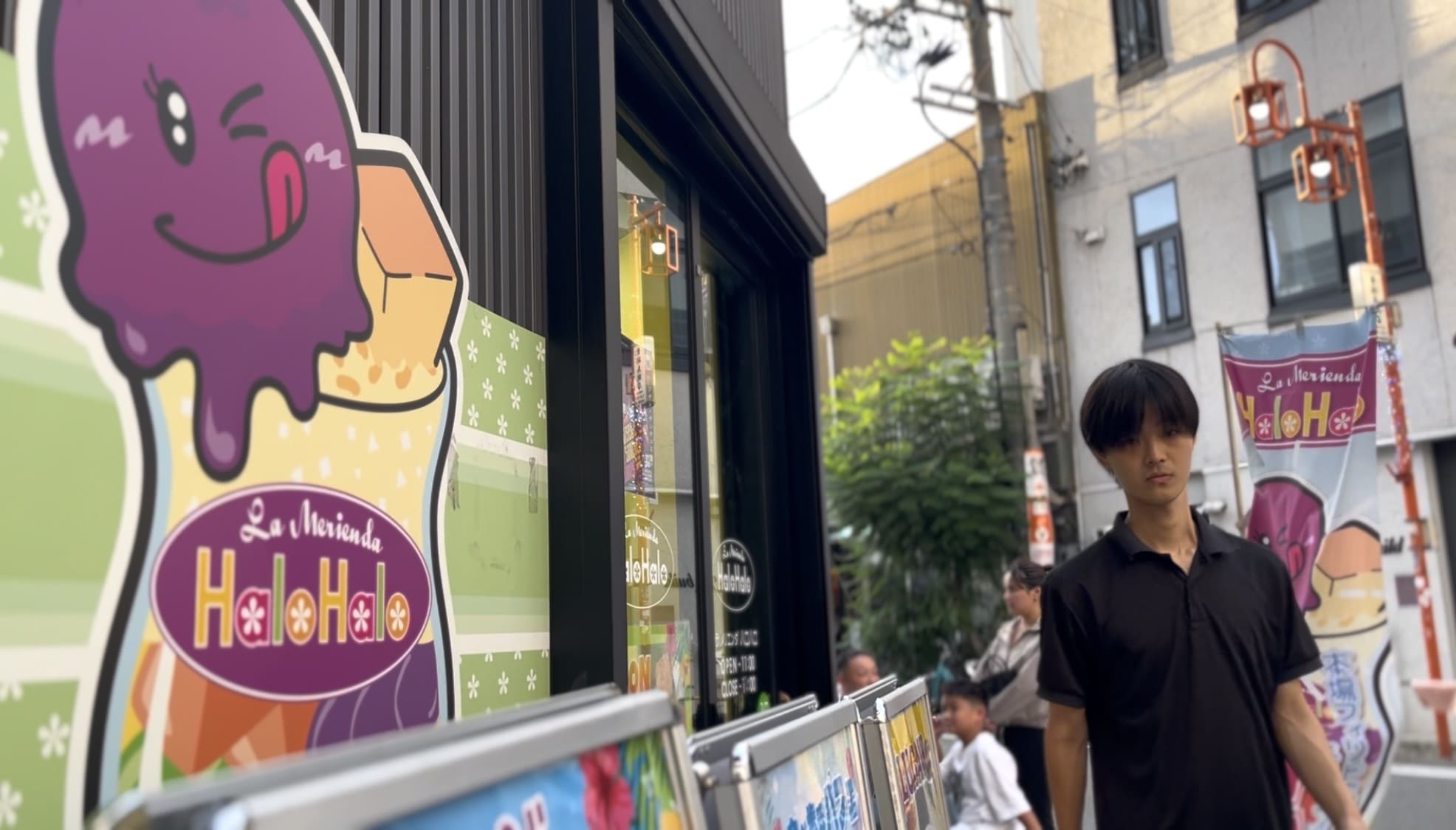 Man leaving a Filipino restaurant in Nagoya