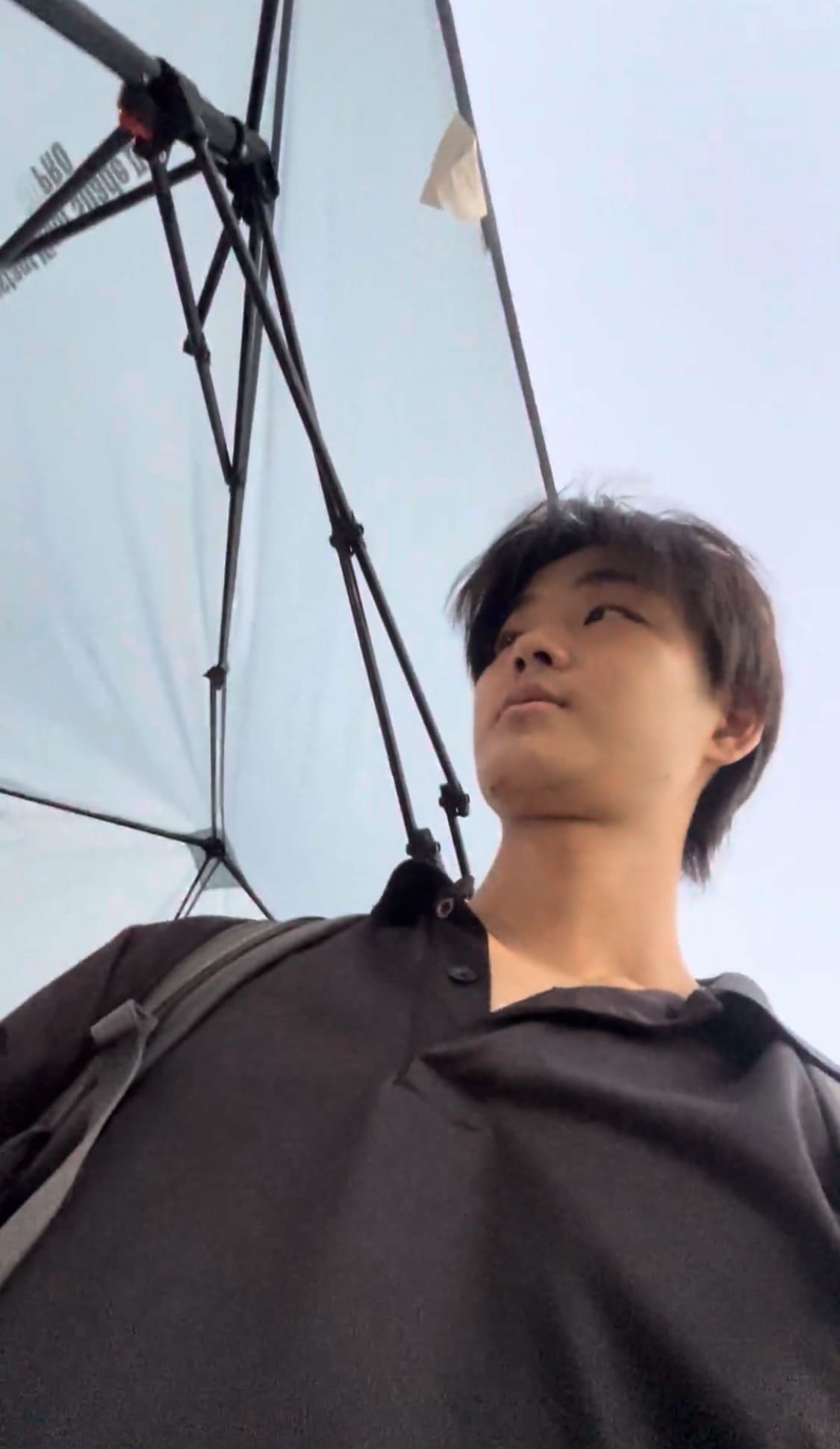 Japanese man listening attentively during a conversation